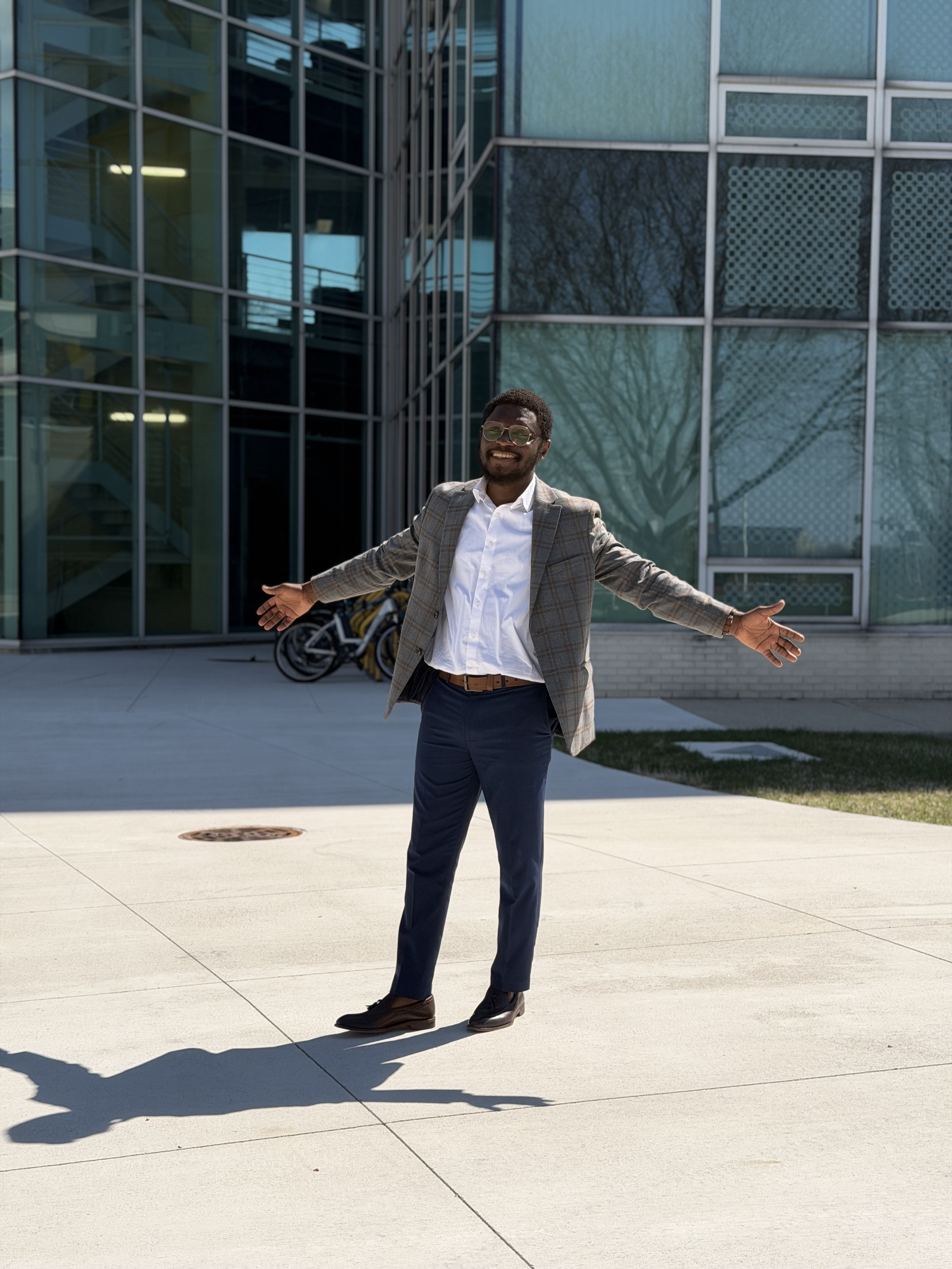 Solomon Teye-Lartey smiling with arms wide open